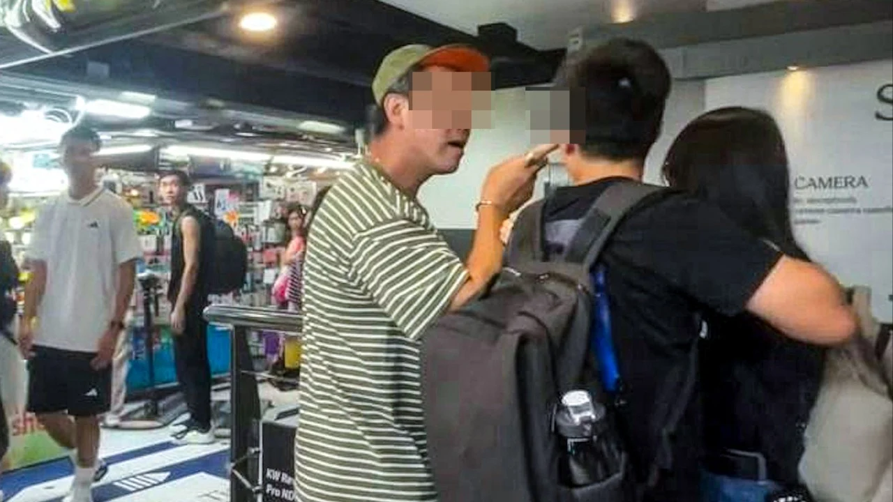 Hong Kong'da tatildeki itfaiyeci alışveriş merkezinde genç çifte saldırdığı iddiasıyla gözaltına alındı