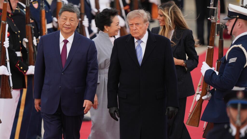 Trump, Xi'yi askeri havaalanında karşıladı: Aİ, ticaret ve İran gündemli ziyaret